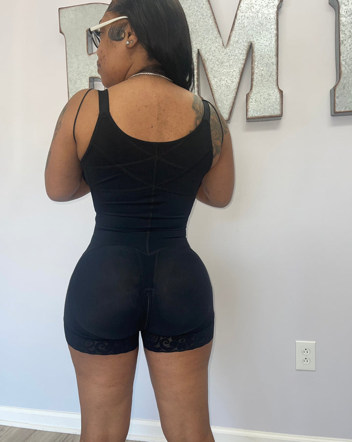 Black high back compression faja shapewear, back view showing seamless design